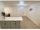 Modern kitchen with white cabinets and marble countertops at 1120 Tucson St, Aurora, CO 80011