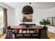 Modern dining room with an oval wood table and stylish chairs at 3422 S Grant St, Englewood, CO 80113