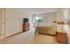 Neutral bedroom with carpet, a double bed, side tables with lamps and dresser with television at 13952 E Marina Dr # 102, Aurora, CO 80014