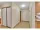 Hallway featuring closet and tile floor at 13952 E Marina Dr # 102, Aurora, CO 80014