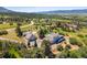 Aerial view of property featuring two houses, detached garage and beautiful views at 2357 Oak Ridge Rd, Sedalia, CO 80135