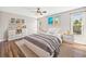 Cozy bedroom with natural light, modern decor, and built-in shelving for stylish storage at 2357 Oak Ridge Rd, Sedalia, CO 80135