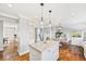 Bright kitchen featuring stainless steel appliances and a center island at 2357 Oak Ridge Rd, Sedalia, CO 80135
