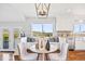 Charming kitchen nook with a window seat, pendant lighting, and scenic mountain views at 2357 Oak Ridge Rd, Sedalia, CO 80135