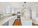 Well-lit kitchen with granite countertops, stainless steel appliances, and modern cabinetry at 2357 Oak Ridge Rd, Sedalia, CO 80135