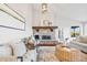 Comfortable living room features a stone fireplace, vaulted ceiling, and stylish decor at 2357 Oak Ridge Rd, Sedalia, CO 80135