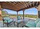 Inviting outdoor space featuring comfortable seating and breathtaking views of the surrounding landscape at 2357 Oak Ridge Rd, Sedalia, CO 80135