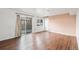 Inviting living room with wood floors, neutral paint, a glass door, and ample natural light at 3700 Miller St, Wheat Ridge, CO 80033