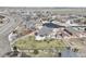 Aerial view of a home showcasing its expansive backyard, three-car garage, and neighborhood surroundings at 5584 Turnbury Cir, Elizabeth, CO 80107
