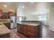 Modern kitchen featuring stainless steel appliances, granite countertops, and an open design at 5584 Turnbury Cir, Elizabeth, CO 80107