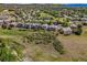 This home backs to open space and greenway, providing privacy and scenic views of lush trees and rolling green hills at 4247 Thistlesage Ct, Castle Rock, CO 80109