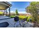 Inviting back patio with outdoor seating and a fire pit, perfect for relaxing and enjoying the views at 4247 Thistlesage Ct, Castle Rock, CO 80109