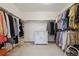 Spacious walk-in closet providing ample storage and organization space at 4247 Thistlesage Ct, Castle Rock, CO 80109