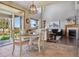 Charming dining area with views into living room and access to the backyard at 4247 Thistlesage Ct, Castle Rock, CO 80109