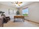 Comfortable home office featuring neutral decor, carpet floors, and a bright window at 4247 Thistlesage Ct, Castle Rock, CO 80109