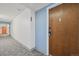 Apartment building hallway with a door to unit 207 at 6930 E Girard Ave # 207, Denver, CO 80224