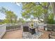 A deck features a built-in grill with space for dining and entertaining with gorgeous scenery views at 8150 W Calhoun Dr, Littleton, CO 80123