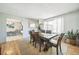 Formal dining room with hardwood floors, bright natural light, and elegant decor at 8150 W Calhoun Dr, Littleton, CO 80123