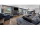 Inviting living room featuring a cozy fireplace and an abundance of natural light at 8150 W Calhoun Dr, Littleton, CO 80123