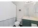 Bathroom with a shower, sink, and toilet featuring a modern design with classic decor at 326 W Jamison Pl # 51, Littleton, CO 80120