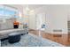 Cozy living room featuring hardwood floors, ample natural light, and comfortable seating at 326 W Jamison Pl # 51, Littleton, CO 80120