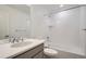 Bathroom with a bathtub, shower, vanity, and toilet at 2571 W 69Th Pl, Denver, CO 80221