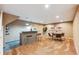 Finished basement with stylish bar area, seating and modern decor at 10293 Rustic Redwood Ct, Highlands Ranch, CO 80126