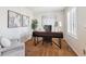 Cozy home office with modern desk, neutral decor, and plenty of natural light at 10293 Rustic Redwood Ct, Highlands Ranch, CO 80126
