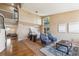 A formal living room featuring soaring ceilings and many windows providing ample natural light at 10293 Rustic Redwood Ct, Highlands Ranch, CO 80126