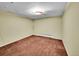 Cozy bedroom features neutral walls, carpet flooring and natural light, creating a peaceful retreat at 6550 E 6Th Avenue Pkwy, Denver, CO 80220