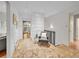 Neutral hallway with lovely decor and tile flooring at 6550 E 6Th Avenue Pkwy, Denver, CO 80220