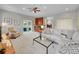 Spacious living room featuring a stylish decor, bar area, and comfortable seating at 6550 E 6Th Avenue Pkwy, Denver, CO 80220