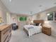 Serene main bedroom with soft lighting, neutral tones, and comfortable furnishings at 6550 E 6Th Avenue Pkwy, Denver, CO 80220