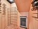 Custom wine cellar with storage racks and built-in wine cooler offers a stylish space for wine enthusiasts at 6550 E 6Th Avenue Pkwy, Denver, CO 80220