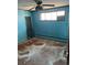 Light blue bedroom with hardwood floors and ceiling fan at 6500 W 14Th Ave, Lakewood, CO 80214