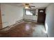 Living room with hardwood floors and ceiling fan at 6500 W 14Th Ave, Lakewood, CO 80214