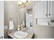 Convenient half bathroom with vanity and modern fixtures at 739 Widgeon Cir, Longmont, CO 80503