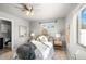 Bright bedroom with ensuite bathroom access and wood floors at 739 Widgeon Cir, Longmont, CO 80503