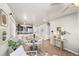 Bright dining area with wood flooring and kitchen views at 739 Widgeon Cir, Longmont, CO 80503