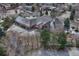 Aerial shot showcasing a large brick house with a covered patio at 14581 E Oberlin Pl, Aurora, CO 80014