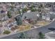 Aerial view of the property highlighting the beautiful landscaping and circular driveway entrance at 14581 E Oberlin Pl, Aurora, CO 80014