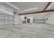 This spacious garage offers plenty of room for storage and hobbies at 14581 E Oberlin Pl, Aurora, CO 80014
