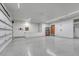 This garage features an epoxy floor for easy clean up and maintenance at 14581 E Oberlin Pl, Aurora, CO 80014