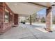 Covered patio with brick columns, stucco ceiling, recessed lighting, and concrete flooring at 14581 E Oberlin Pl, Aurora, CO 80014