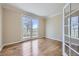 Bright home office with hardwood floors, French doors, and scenic views at 16021 Verbena St, Brighton, CO 80602