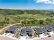 Birds eye view of three luxury homes with views of the open countryside at 5225 Mesa Top Dr, Monument, CO 80132