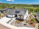New construction home with a three-car garage, modern landscaping, and gorgeous mountain views at 5225 Mesa Top Dr, Monument, CO 80132