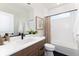 Well-lit bathroom features a white subway tile shower and a stylish vanity at 5225 Mesa Top Dr, Monument, CO 80132