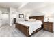 Bedroom featuring a wooden bed frame, soft carpet, and a walk-in closet at 5225 Mesa Top Dr, Monument, CO 80132