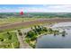 Aerial view of a community near a lake with a marina and a park at 3852 S Dallas St # 8-102, Aurora, CO 80014